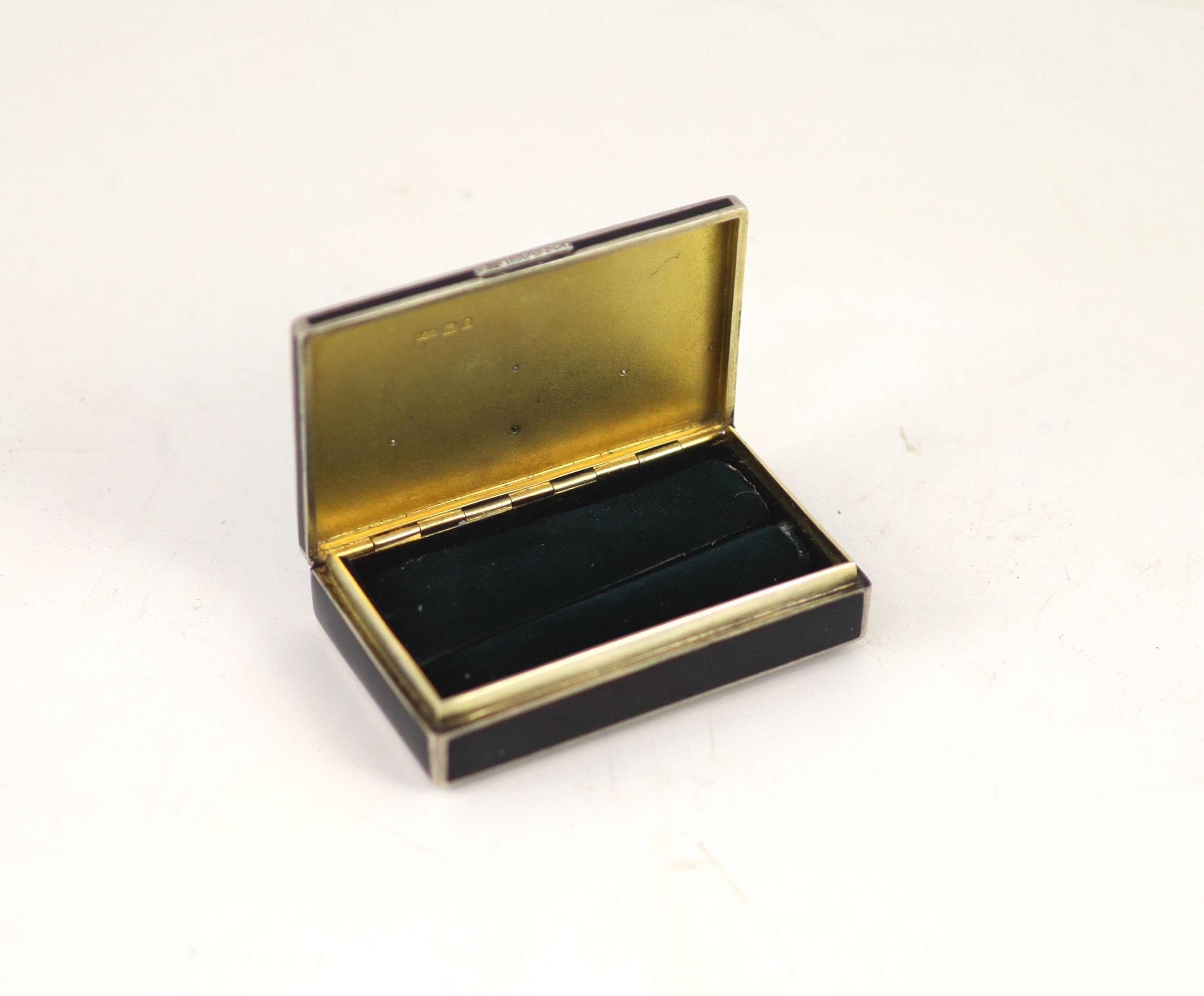A 1930's silver, black enamel and rose cut diamond set rectangular snuff box, by S.J. Rose & Son